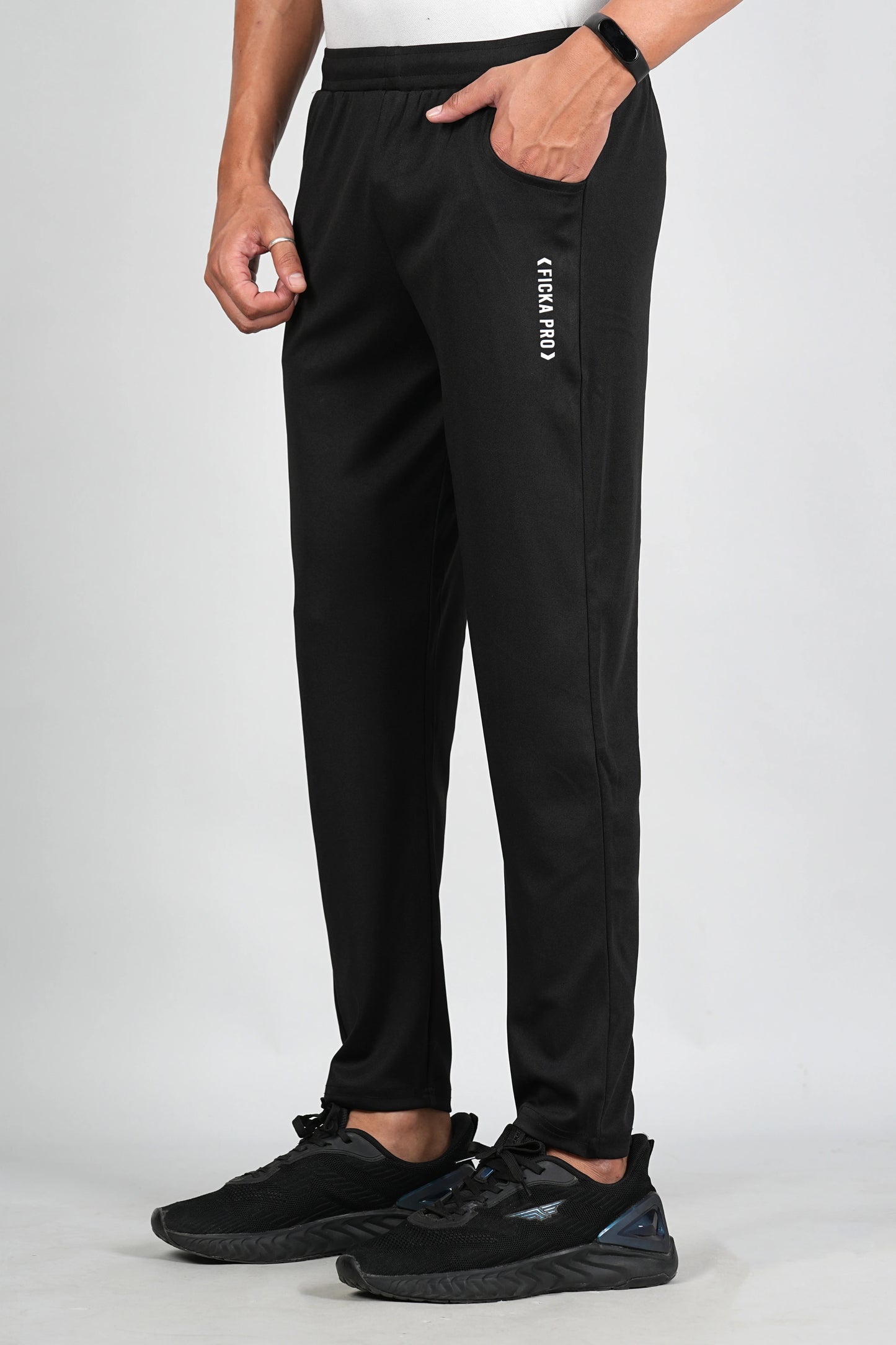 Black trackpant for men side view showing elastic waistband