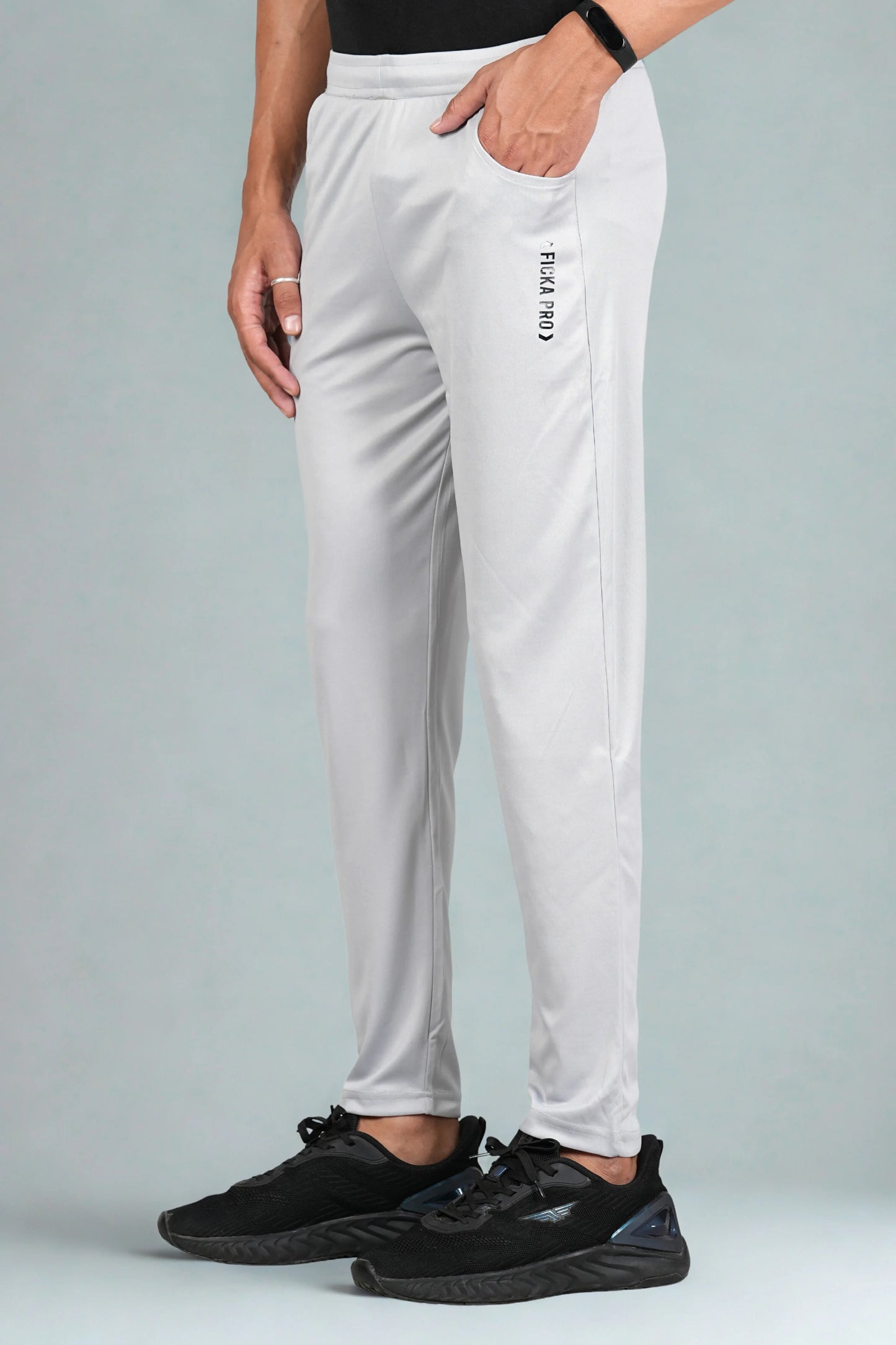 Light grey sports trackpant for men side view showing elastic waistband