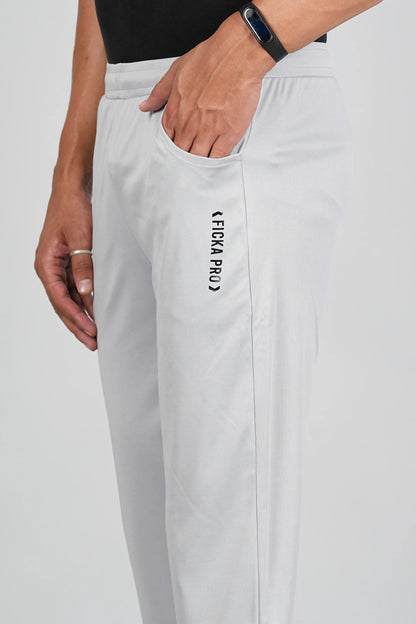 Light grey sports trackpant fabric close-up showing soft breathable material