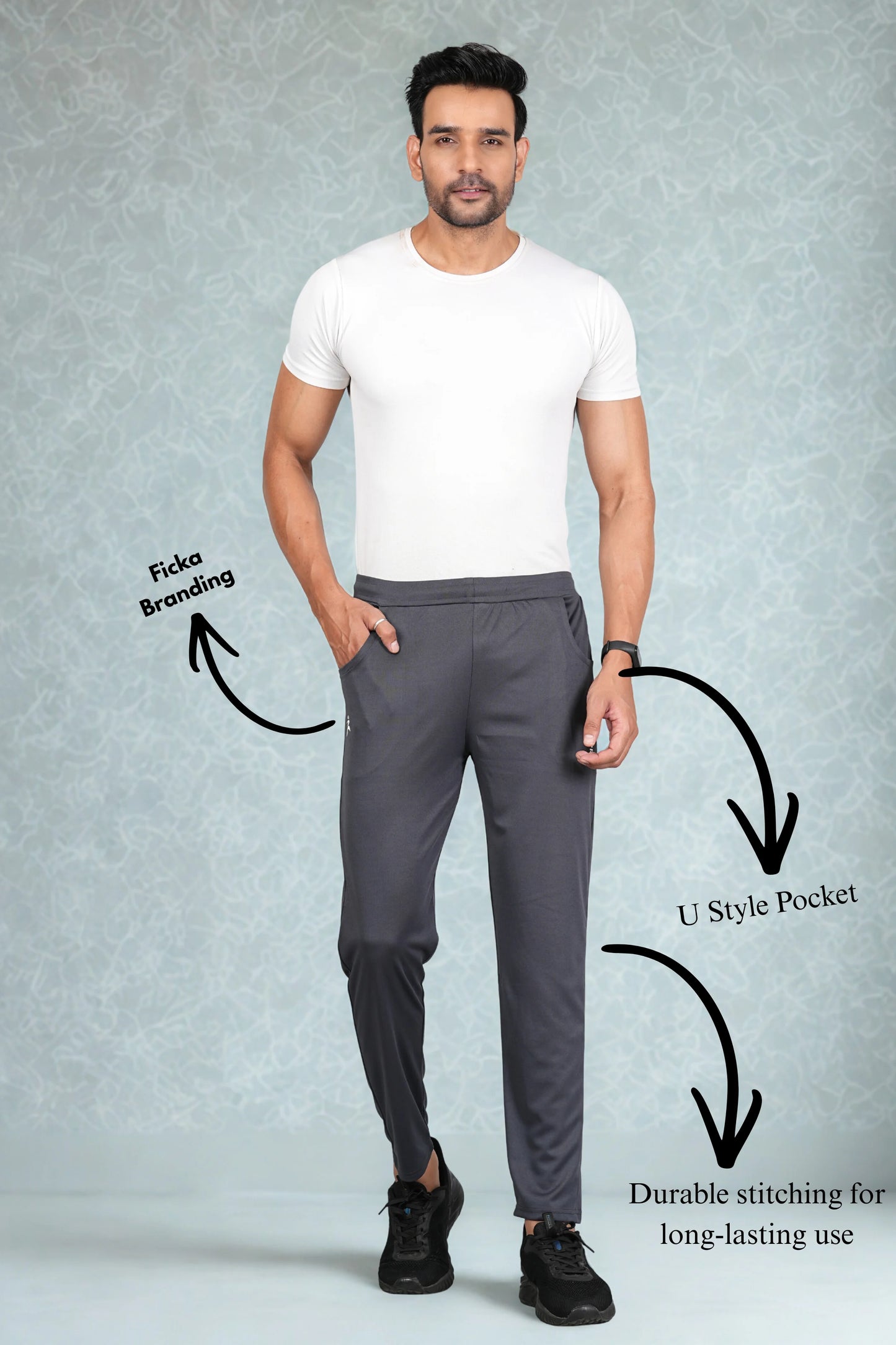 Dark grey trackpant fabric close-up showing soft breathable material