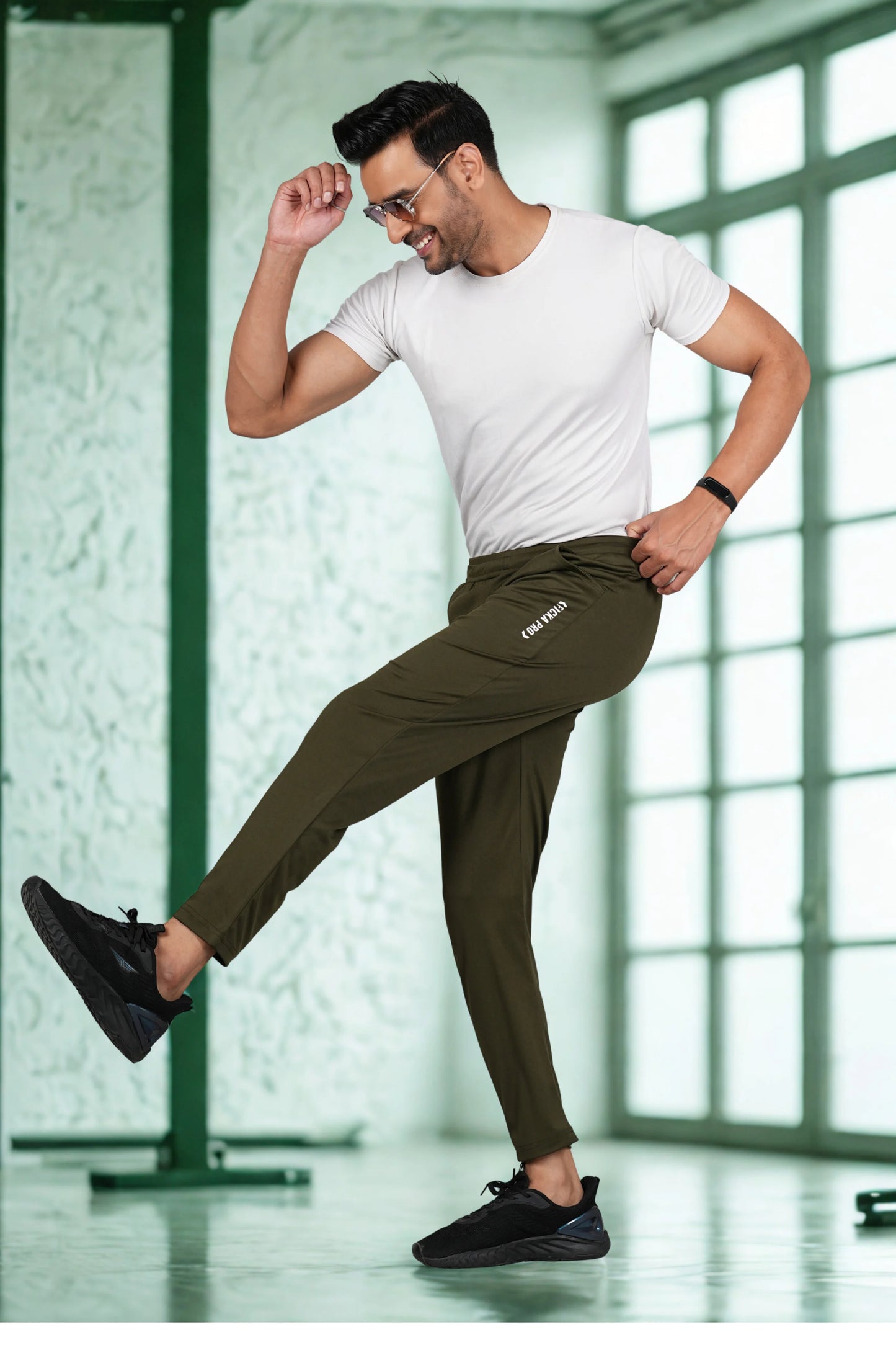 FICKA olive sports trackpant fabric Gym and  showing breathable material