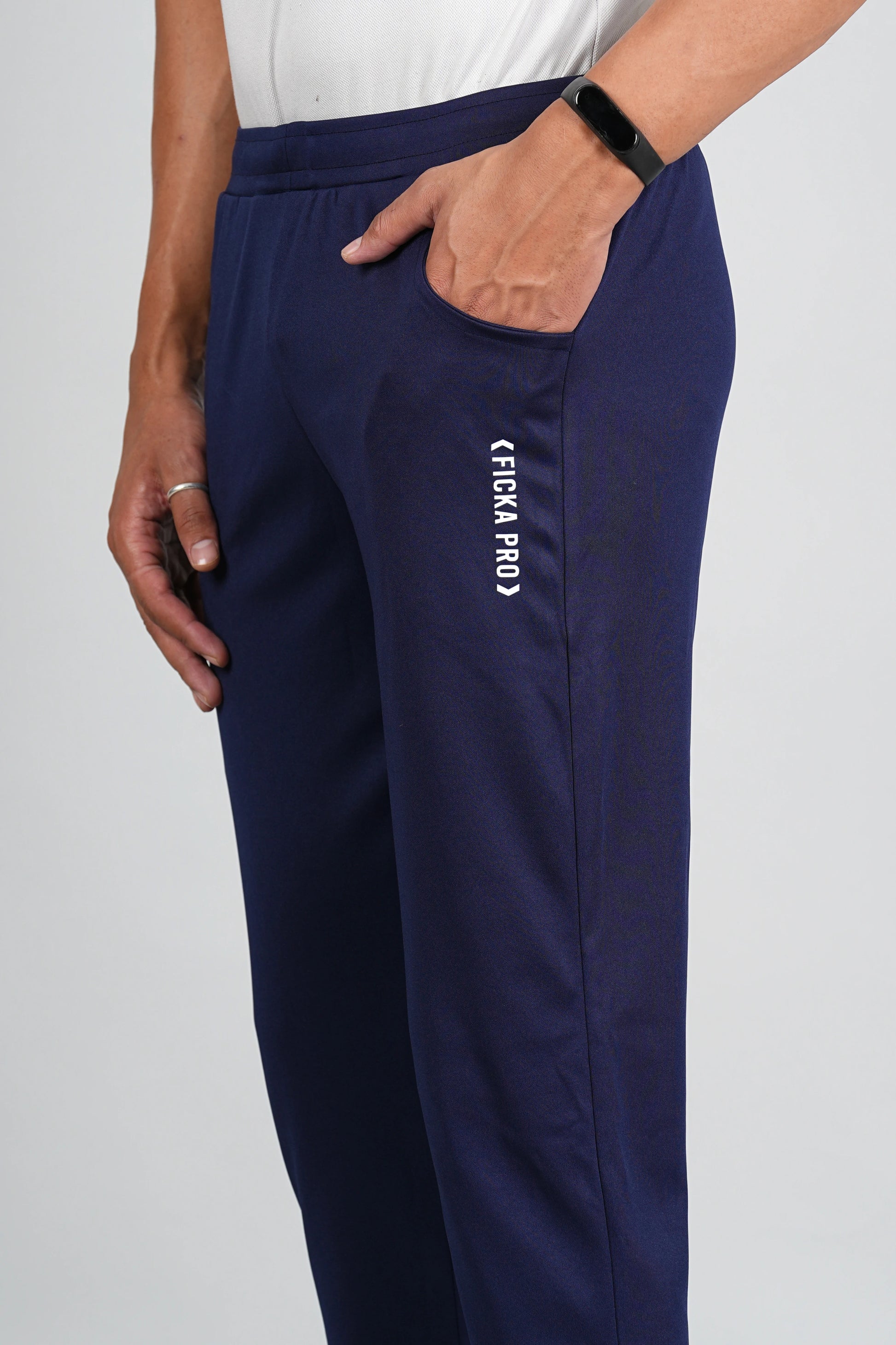 Navy blue trackpant fabric close-up showing soft breathable material